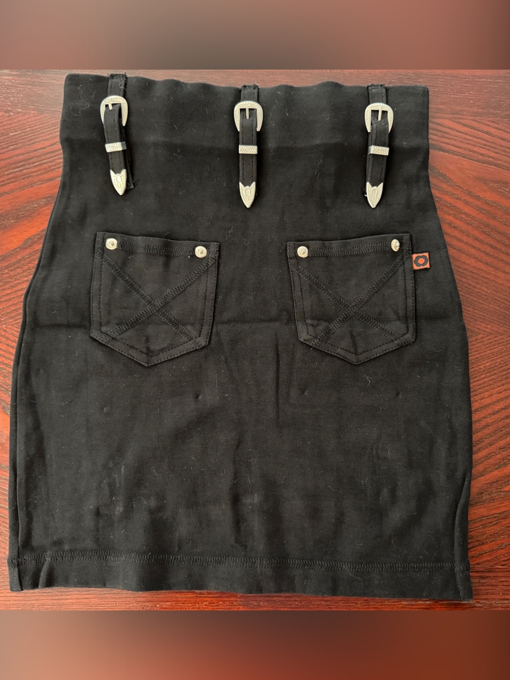 Black Mini Skirt with Buckle Detail and Front Pockets